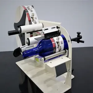 TAKE-A-LABEL  TAL-1100MR Manual Round Product Label Applicator, 1 x 1 Inch Min. Label Size, 5 Inch Label Width | CJ4PEM 11000